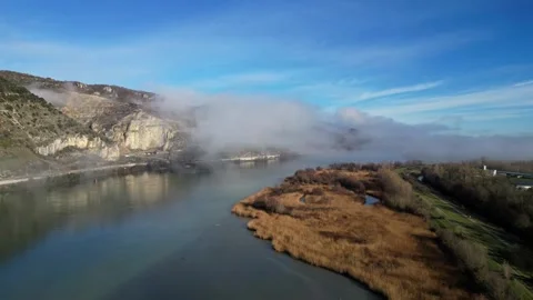 Drone Flight Over the Rhone River in Southern France, with Dense Morning Fog Stock Footage 300837004