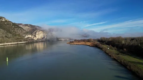 Drone Flight Over the Rhone River in Southern France, with Dense Morning Fog Stock Footage 300837228