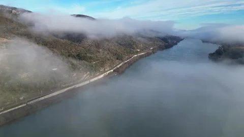 Drone Flight Over the Rhone River in Southern France, with Dense Morning Fog Stock Footage 300866901