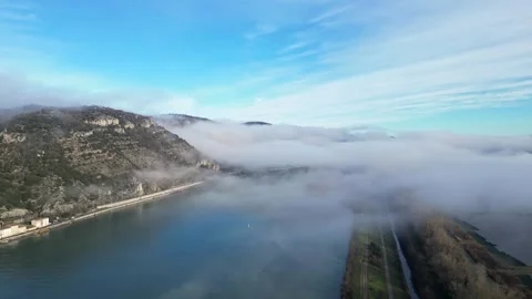 Drone Flight Over the Rhone River in Southern France, with Dense Morning Fog Stock Footage 300866930