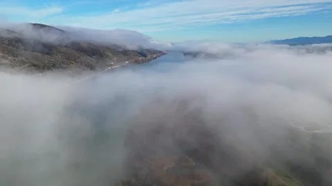Drone Flight Over the Rhone River in Southern France, with Dense Morning Fog Stock Footage 300891196