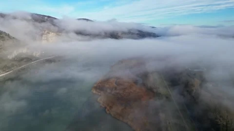 Drone Flight Over the Rhone River in Southern France, with Dense Morning Fog Stock Footage 300891233