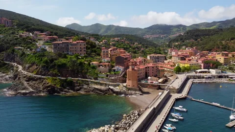 Drone flight over Rio Marina village by the sea Stock Footage 323030356