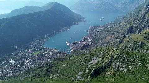 Drone Flight Over Risan Bay Revealing Towns on Montenegro Shoreline – 4K Stock Footage 313900736