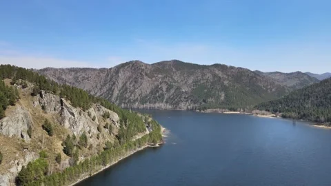 Drone flight over the river and mountains and forest on a sunny day Video stock 199041628