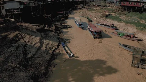 Drone flight over the river in Floating Village in Cambodia, Pean Bang, Tonle Stock Footage 118531411