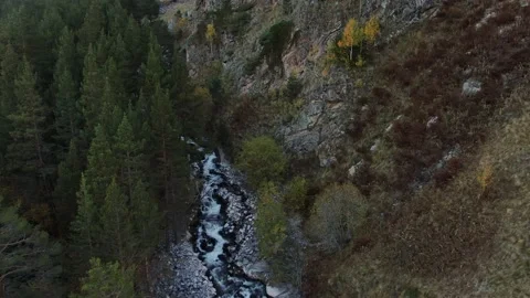 Drone flight over the river flowing from the slopes of Elbrus. Top view. Stock Footage 147638545