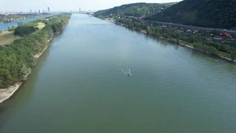 Drone flight over river in the middle sails a boat 스톡 동영상 201009419
