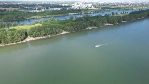 Drone flight over river in the middle sails a boat Stock Footage 201010713
