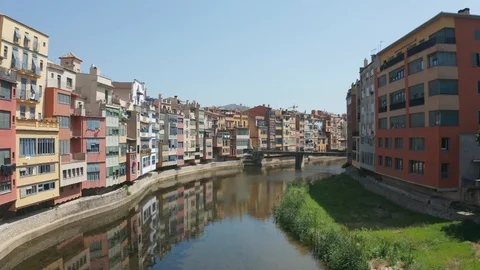 Drone flight over river Onyar and Girona houses Stock Footage 112889899