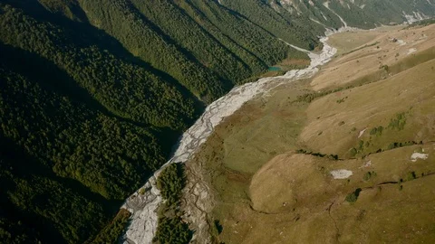 Drone flight over a river in the vicinity of Adishi Stock Footage 116665989