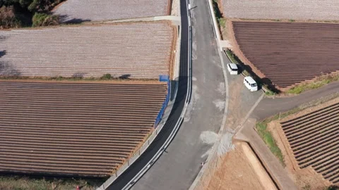 Drone flight over road and rice fields Japan Stock Footage 311227414