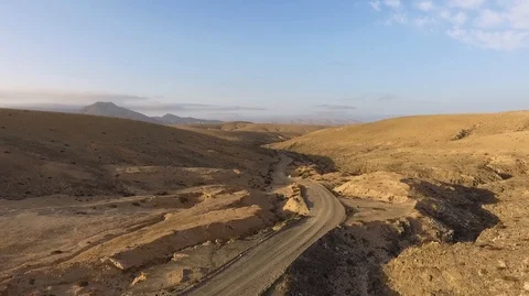 Drone flight over a road in the desert Stock Footage 92064907