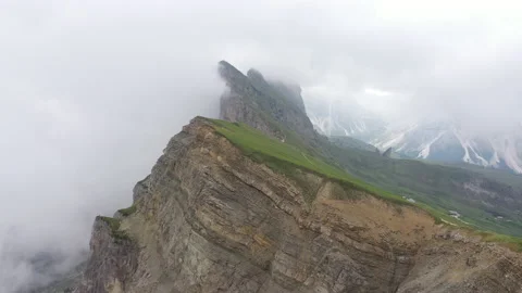 Drone flight over rugged mountain scenery of Seceda in the Dolomites in Italy Stock Footage 136764633
