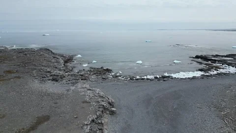 Drone Flight Over Rugged North Newfoundland Coast with Ice Fragments Stock Footage 253256686