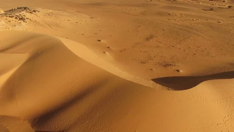 Drone flight over sand dunes at Meroe in Sudan Stock Footage 95529759