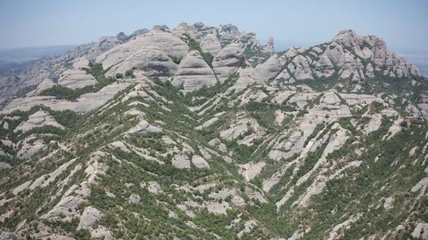 Drone flight over saw mountain range of Montserrat Stock Footage 112970642