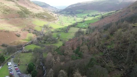 Drone Flight Over Scenic Valley in Wales with Winding Road in 4K Video stock 330518183