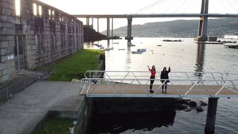 Drone flight over the sea with the Rande Bridge on the background in Vigo (Ga Stock Footage 124385266