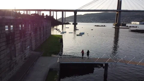 Drone flight over the sea with the Rande Bridge on the background in Vigo (Ga Stock Footage 124385288