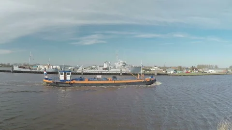 Drone flight over a ship on a river 스톡 동영상 49100310