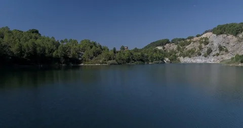Drone flight over small lagoon in inland Stock-Footage 93392274