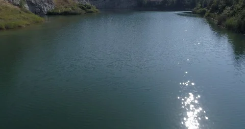 Drone flight over small lagoon in inland Stock-Footage 93392311