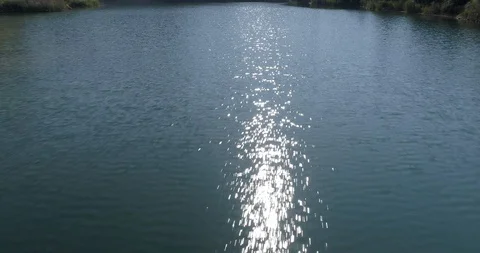 Drone flight over small lagoon in inland Stock-Footage 93392367