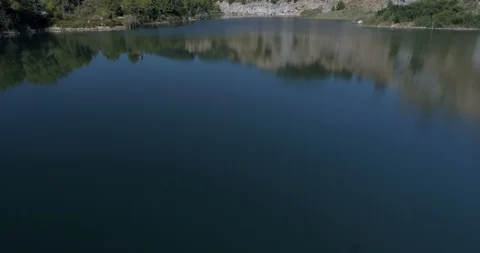 Drone flight over small lagoon in inland Stock-Footage 93392512