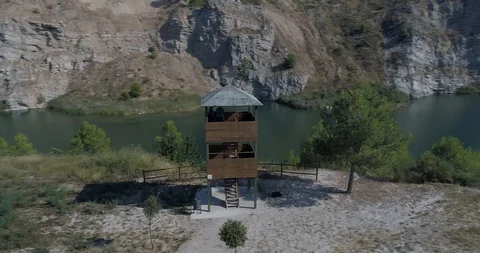 Drone flight over small lagoon in inland Stock Footage 93392765