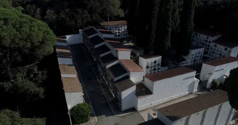 Drone flight over small outdoor cemetery in the forest Stock Footage 95899599