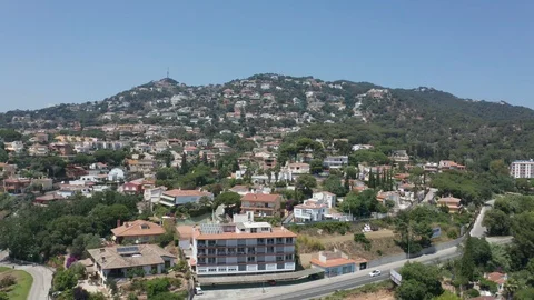 Drone flight over small resort town Lloret de Mar Stock Footage 115899324