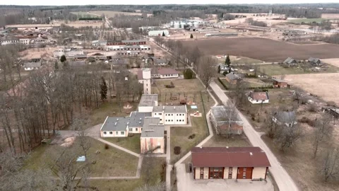 Drone flight over small rural vilage Umurga during spring time, Latvia 動画素材 152715866