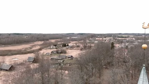 Drone flight over small rural vilage Umurga during spring time, Latvia 動画素材 152718093
