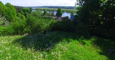 Drone flight over the small village and Nemunas river - 3 Stock Footage 77666243