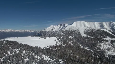 Drone flight over Snow and Mountain in Italy. Video stock 106758051