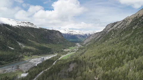 Drone Flight Over Snow-Capped Mountains and Valley in Summer 库存影片 277804100
