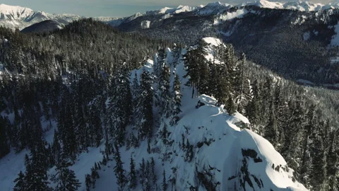 Drone Flight Over Snow Covered Mountain Ridge with Stunning Background View Stock-Footage 148605668