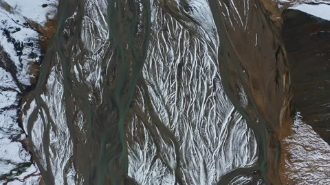 Drone Flight Over Snow Covered Braided Riverbed Stock Footage 168774403