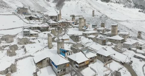 Drone Flight Over Snow Covered Adishi Village in Svaneti Georgia Stock Footage 339283902