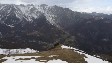 Drone flight over the snowy mountain in winter. peak and ridge view, alps 4k Stock Footage 152578333