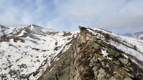 Drone flight over the snowy mountain in winter. peak and ridge view, alps 4k Stock Footage 152578374
