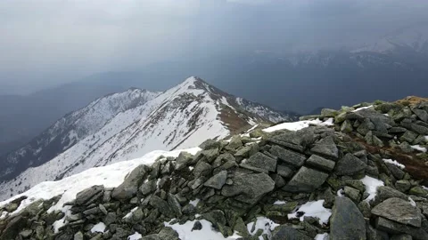 Drone flight over the snowy mountain in winter. peak and ridge view, alps 4k Stock Footage 152578459