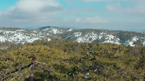 Drone flight over the snowy mountains Stock Footage 247966775