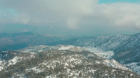 Drone flight over the snowy mountains Stock Footage 247968956