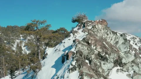 Drone flight over the snowy mountains of Troodos Stock Footage 248058870