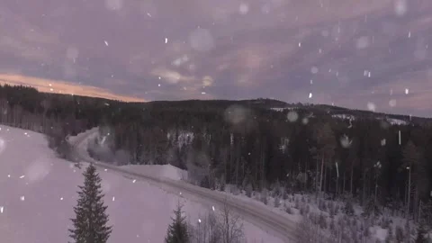 Drone Flight Over Snowy Mountains with Falling Snow Stock Footage 330278955