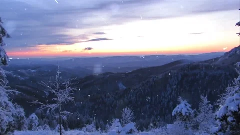 Drone Flight Over Snowy River Valley at Sunset with Falling Snow Stock Footage 330278565