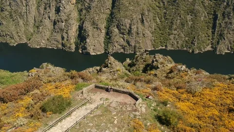 Drone flight over some tourists on the Sil Canyons viewpoint Stock Footage 123217000