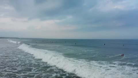 Drone flight over surfers in Aoshima Miyazaki Japan Stock Footage 259363405